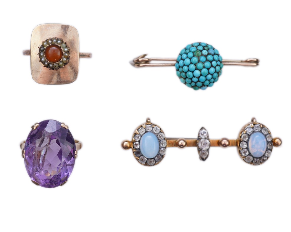 Three rings and a brooch